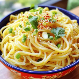 You can use a variety of noodles for this dish. I recommend: - 8 oz udon noodles - 8 oz spaghetti - 8 oz rice noodles Choose the type you love most. Each noodle adds a unique texture. Udon gives a chewy bite, while spaghetti is classic and easy. Here is what you need for the base flavor: - 4 tablespoons olive oil - 6 cloves garlic, minced - 2 tablespoons red chili flakes (adjust to taste) - 2 tablespoons soy sauce - 1 tablespoon sesame oil - 1 tablespoon sugar - 1 tablespoon rice vinegar These ingredients create a spicy, savory sauce. The garlic and chili flakes bring the heat, while the sugar and vinegar balance the flavors. Garnish your dish for added color and taste: - 2 green onions, finely sliced - Fresh cilantro, for garnish - Sesame seeds, for garnish These toppings add freshness and crunch. The green onions give a nice bite, and cilantro adds a fresh pop. Sesame seeds bring a nutty flavor and look great on top. Start by boiling a pot of water. Add salt to the water for flavor. Once boiling, add 8 oz of your favorite noodles, like udon or spaghetti. Cook according to the package instructions until they are al dente. This usually takes about 8 to 10 minutes. Once done, drain the noodles and set them aside. In a small bowl, mix together the soy sauce, sesame oil, sugar, and rice vinegar. Use a whisk to blend these ingredients well. Make sure the sugar fully dissolves. This sauce gives the noodles a rich flavor. Set the sauce aside for later. Heat 4 tablespoons of olive oil in a large skillet or wok over medium heat. Once hot, add 6 cloves of minced garlic. Sauté the garlic for 1 to 2 minutes. You want it fragrant but not browned. Next, stir in 2 tablespoons of red chili flakes. Cook for another minute to let the heat infuse the oil. Now, add the cooked noodles to the skillet. Pour the sauce over the noodles. Toss everything together until the noodles are well-coated. Add sliced green onions and toss again. Remove from heat and let it sit for a minute. This helps the flavors mix well. Enjoy your spicy garlic noodles! To get the best noodle texture, cook them just right. Boil water with salt. Add your noodles and check them often. You want them al dente, which means they should be firm but not hard. After cooking, drain the noodles quickly. Rinse them under cold water to stop the cooking process. This keeps them from getting mushy. If you love heat, add more red chili flakes. Start with two tablespoons, then taste. You can always add more, but you can't take it out. If the spice is too much, add a bit of sugar to balance it. Sugar helps to cool down the heat while adding flavor. To boost flavors, try adding fresh herbs like cilantro. It gives a fresh taste that works great. You can also use lime juice for a zesty kick. Mixing different sauces can create deeper flavors. Consider adding hoisin sauce or a splash of fish sauce for umami. Each small change can make a big difference! {{image_2}} You can easily boost your spicy garlic noodles with protein. Here are some tasty options: - Chicken: Use cooked chicken breast, diced into bite-sized pieces. - Shrimp: Sauté shrimp in the garlic oil until pink and add them to your noodles. - Tofu: Press and cube firm tofu. Sauté until golden before tossing with the noodles. - Beef: Thinly slice steak or flank and stir-fry it before mixing it in. Adding protein not only makes your meal heartier but also adds more flavor. Vegetables can add color and texture to your dish. Consider these options: - Bell Peppers: Slice them thin and stir-fry for a crunchy bite. - Broccoli: Steam or sauté small florets for added nutrition. - Carrots: Julienne or shred carrots for a sweet crunch. - Spinach: Toss in fresh spinach at the end for a pop of green. These vegetables enhance the dish and provide vitamins and minerals. You can switch up the sauce to create different flavor profiles. Try these: - Hoisin Sauce: Replace soy sauce with hoisin for a sweet twist. - Chili Garlic Sauce: Mix this for an extra kick. - Peanut Sauce: Use this for a creamy, nutty flavor. - Teriyaki Sauce: For a sweet and tangy option, this works well too. Experimenting with sauces can lead to exciting new versions of spicy garlic noodles. After you enjoy your spicy garlic noodles, cool any leftovers. Place them in an airtight container. Make sure to store them in the fridge. They will stay fresh for up to three days. Keep the noodles separate from any sauce if possible. This helps maintain their texture. To reheat, you can use the microwave or the stove. If using the microwave, place the noodles in a bowl. Add a splash of water to keep them moist. Heat for one to two minutes. Stir halfway through for even warmth. If using the stove, add the noodles to a pan. Heat on low, adding a bit of oil if needed. Stir often until heated through. You can freeze your spicy garlic noodles for later. First, let them cool completely. Place the noodles in a freezer-safe bag or container. Remove as much air as possible before sealing. They will last for up to two months in the freezer. When ready to eat, thaw them in the fridge overnight. Reheat as mentioned above. Yes, you can use many types of noodles. Udon, spaghetti, or rice noodles all work well. Each type gives a different taste and texture. For instance, udon noodles are thick and chewy. They hold the sauce nicely. Spaghetti gives a more classic feel. It’s fun to try different kinds! To make it spicier, add more red chili flakes. Start with one more tablespoon, then taste. You can also add sliced fresh chilies for extra heat. If you like a kick, try chili oil or hot sauce. Just remember to adjust the spice level to your liking. Garnishing makes your dish pop! Fresh cilantro adds a bright flavor. Thinly sliced green onions bring crunch. Sesame seeds add a nice texture and nutty taste. You can also sprinkle some crushed peanuts for a fun twist. Choose the garnishes you love most! This blog post showed you how to create tasty spicy garlic noodles. We covered noodle choices, key ingredients, and great toppings. You learned to cook the noodles and make a sauce. We shared tips to get the right texture and spice. You also found out how to add protein and veggies. Plus, we explained how to store and reheat your dish. In the end, making spicy garlic noodles is simple and fun. Enjoy your cooking and be creative!