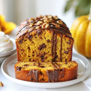 - 1 cup pumpkin puree (canned or homemade) - 1/2 cup vegetable oil - 1/2 cup brown sugar, packed - 1/2 cup granulated sugar - 3 large eggs - 1 1/2 cups all-purpose flour - 1/2 teaspoon baking soda - 1 teaspoon baking powder - 1 teaspoon ground cinnamon - 1/2 teaspoon ground nutmeg - 1/2 teaspoon ground ginger - 1/2 teaspoon salt - 1 cup semi-sweet chocolate chips - 1/2 cup chopped walnuts (optional) To make the best chocolate chip pumpkin bread, gather these key ingredients. Pumpkin puree gives moisture and flavor. You can use either canned or fresh puree. The sugars add sweetness and help create a lovely crust. Use both brown and granulated sugar for a rich taste. Vegetable oil keeps the bread soft. Eggs add structure and help the bread rise. For dry ingredients, mix all-purpose flour with baking soda and baking powder for lift. Spices like cinnamon, nutmeg, and ginger bring warmth and depth to each slice. Don’t forget the salt! It enhances all the flavors. Chocolate chips are what make this bread a treat. Use semi-sweet chips for a nice balance of sweetness. If you like a little crunch, add walnuts. They add texture and nutty flavor. Having all these ingredients ready makes your baking easy and fun! {{ingredient_image_1}} First, set your oven to 350°F (175°C). This step warms the oven for baking. Next, get a 9x5-inch loaf pan. You can grease it with some oil or line it with parchment paper. This way, your bread will come out easily. Now, take a large mixing bowl. Add 1 cup of pumpkin puree, 1/2 cup of vegetable oil, 1/2 cup of brown sugar, and 1/2 cup of granulated sugar. Mix these ingredients well until they look creamy and smooth. This blend gives your bread its moist texture. In another bowl, whisk together 1 1/2 cups of all-purpose flour, 1/2 teaspoon of baking soda, 1 teaspoon of baking powder, 1 teaspoon of ground cinnamon, 1/2 teaspoon of ground nutmeg, 1/2 teaspoon of ground ginger, and 1/2 teaspoon of salt. This mix adds flavor and helps your bread rise. Gradually add the dry mix to the wet mix. Stir gently until just combined. It's important not to overmix, as this can make the bread tough. Then, fold in 1 cup of semi-sweet chocolate chips and optional 1/2 cup of chopped walnuts. This adds a delightful crunch and sweetness. Pour the batter into your prepared loaf pan. Smooth the top with a spatula. Bake it in the preheated oven for 55-65 minutes. You will know it’s done when a toothpick inserted in the center comes out clean. Let it cool in the pan for about 10 minutes, then transfer it to a wire rack to cool completely. Enjoy the aroma as it fills your kitchen! To bake the best chocolate chip pumpkin bread, follow these tips: - Use fresh ingredients. Check the dates on your baking items. - Measure flour correctly. Spoon flour into the cup, then level it off. - Don't overmix. Stir until just combined for a soft texture. - Use room temperature eggs. They blend better with the batter. - Check your oven temp. An oven thermometer helps ensure accuracy. Here are some common mistakes and how to avoid them: - Skipping the greasing. Always grease the pan to prevent sticking. - Using cold ingredients. Cold items can lead to uneven mixing. - Overbaking. Start checking the bread at 55 minutes. - Not letting it cool. Allowing it to cool prevents sogginess. You can enhance the flavor and texture of your bread with these tips: - Add spices. Try a pinch of allspice or cloves for warmth. - Use different chips. Swap semi-sweet for dark or white chocolate. - Add nuts. Chopped walnuts or pecans add crunch. - Serve warm. Warm slices with butter or whipped cream taste amazing. Pro Tips Use Fresh Pumpkin: For a more robust flavor, consider using fresh pumpkin puree instead of canned. Roasting your own pumpkin can enhance the taste of your bread. Don’t Overmix: To achieve a tender crumb, mix the batter just until the dry ingredients are incorporated. Overmixing can lead to a dense loaf. Storage Tips: Keep the bread in an airtight container at room temperature for up to 3 days. For longer storage, wrap it tightly and freeze for up to 3 months. Experiment with Spices: Feel free to adjust the spices to your preference. Adding a pinch of cloves or allspice can give your pumpkin bread an extra warm flavor kick. {{image_2}} You can easily make this bread gluten-free. Just swap all-purpose flour with gluten-free flour. Use a blend that works well in baking. This change keeps the texture light. The taste stays rich and moist. To make a vegan version, replace eggs with flax eggs. Mix one tablespoon of flaxseed meal with three tablespoons of water. Let it sit for a few minutes to thicken. Also, use plant-based oil instead of vegetable oil. This keeps the bread soft and tasty. Add-ins can elevate your pumpkin bread. Try mixing in dried cranberries or raisins for a fruity twist. Chopped pecans or almonds can add a nice crunch. For extra spice, add more cinnamon or a hint of allspice. You can even swirl in some cream cheese for a rich layer. Each variation brings a new flavor profile. Experiment to find your favorite mix! After enjoying your chocolate chip pumpkin bread, store any leftovers properly. Wrap the bread in plastic wrap or aluminum foil. This keeps it fresh and moist. You can also place it in an airtight container. Store it at room temperature for up to three days. If you want it to last longer, consider freezing. To freeze chocolate chip pumpkin bread, slice it first. This makes it easy to grab a piece later. Wrap each slice in plastic wrap tightly. Then, place the wrapped slices in a freezer-safe bag. Label the bag with the date. Your bread will stay fresh for about three months in the freezer. When you're ready to eat, just thaw it at room temperature. Reheating your pumpkin bread can bring back its fresh taste. If you want a warm slice, use the oven. Preheat it to 350°F (175°C). Place the bread on a baking sheet for about 10 minutes. You can also use a microwave. Heat a slice for about 15-20 seconds. Enjoy it warm, and feel free to add butter or whipped cream on top! Yes, you can use fresh pumpkin. Cook and puree the pumpkin until smooth. Fresh pumpkin may taste better, but it requires extra steps. Make sure to measure one cup of puree for the recipe. Check the bread with a toothpick. Insert it into the center. If it comes out clean, the bread is done. It usually takes 55 to 65 minutes to bake. Keep an eye on it towards the end. You can use melted coconut oil or applesauce. Both give moisture and flavor. If you want a lighter option, use unsweetened applesauce. Just keep the same amount in the recipe. Yes, you can skip the chocolate chips. The bread will still taste great. If you want more texture, try adding nuts or dried fruit instead. The flavor of pumpkin shines through without chocolate. This blog post covered pumpkin bread from start to finish. We explored the key ingredients, step-by-step baking instructions, and helpful tips. I shared ways to tweak the recipe for dietary needs and creative flavors. Finally, I explained how to properly store your bread and answered common questions. Remember, baking should be fun. With practice, you will create delicious pumpkin bread everyone loves. Enjoy your baking journey!